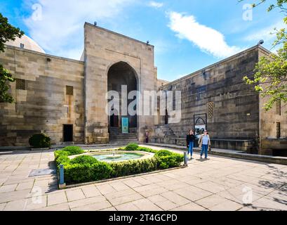 The main courtyard entrance to the palace grounds and museum. At the Palace of the Shirvanshahs complex in the Old City section of Baku, Azerbaijan. Stock Photo