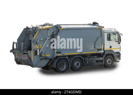 Garbage trucks into waste emptying containers for waste disposal, solate on white background, Clipping path Stock Photo