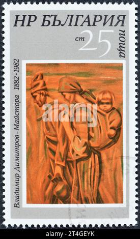 Cancelled postage stamp printed by Bulgaria, that shows painting Reapers,  100th birthday of Vladimir Dimitrov, circa 1982. Stock Photo