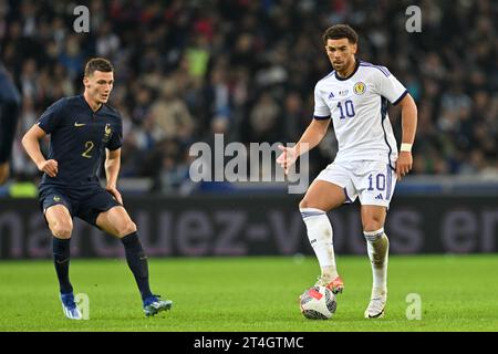 Benjamin Pavard (2) of France and Che Adams (10) of Scotland pictured during a soccer game between the national teams of France and Scotland in friendly game, on October 17 , 2023 in Lille, France. (Photo by David Catry / Sportpix) Stock Photo