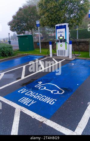 EV, charger installation, BP pulse, charging points, plug into fast, rapid, ultra-fast chargers, convenient, plug in, charging speeds, fleet charging. Stock Photo