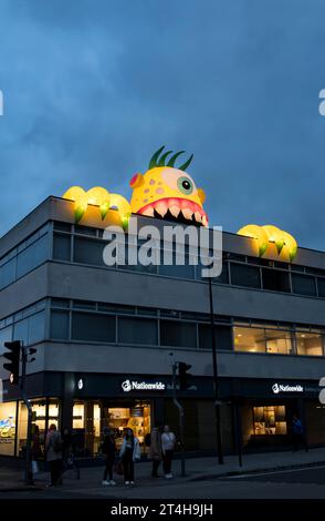 Yellow monster on top of Nationwide building, St Mary's Road, Lincoln City, Lincolnshire, England, UK Stock Photo