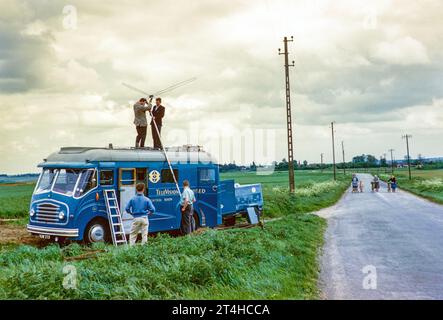 ATV television ITV company outside broadcast vehicle, erecting television antenna aerial on top of van, UK 1960s Stock Photo