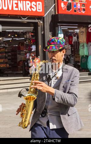 England, London, Leicester Square, Busker Playing Saxophone Stock Photo