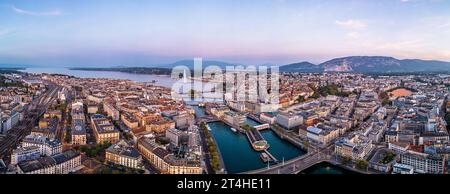 Geneva, Switzerland skyline view towards the Jet d'Eau fountain in Lake Geneva at twilight. Stock Photo