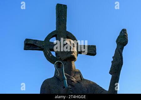 Statue of Saint Aidan by Kathleen Parbury (1958), at the Parish Church of St. Mary,  Holy Island, Northumberland, England, UK Stock Photo
