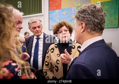 THE HAGUE - Ilona Lagas (BBB) in consultation with the other first chamber members in the Senate after the vote. Members of the Senate cast a vote on the dispersal law. The SGP faction in the Senate wanted the distribution law for a fair distribution of asylum seekers among municipalities to be declared controversial. ANP PHIL NIJHUIS netherlands out - belgium out Stock Photo