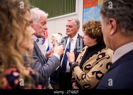 THE HAGUE - Ilona Lagas (BBB) in consultation with the other first chamber members in the Senate after the vote. Members of the Senate cast a vote on the dispersal law. The SGP faction in the Senate wanted the distribution law for a fair distribution of asylum seekers among municipalities to be declared controversial. ANP PHIL NIJHUIS netherlands out - belgium out Stock Photo