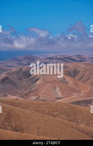 A landscape suitable for any project requiring volcanic landscapes, mountainous terrain, Lanzarote, volcanic islands, or natural photographic journeys Stock Photo