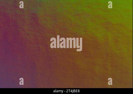 Holographic purple and green gradient metal texture background Stock Photo