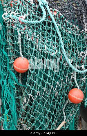 Fishing Net and Orange Buoys Stock Photo