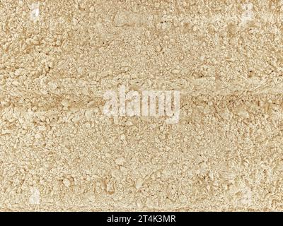 yellow sand texture from sand pile background Stock Photo