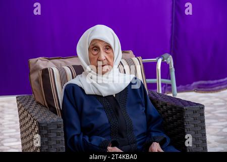 portrait for Old muslim woman using walker Stock Photo