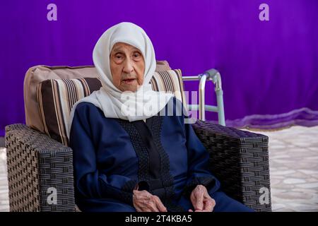 portrait for Old muslim woman using walker Stock Photo