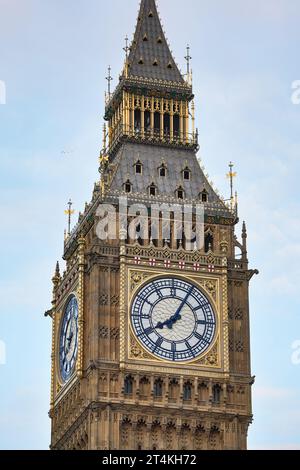 Big Ben tower clockface on Great Clock of Westminster parliament houses, closeup detail to gothic decoration. It was completed in 1859. Hands painted Stock Photo