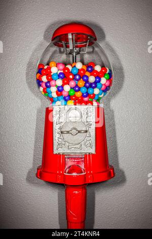 Gumballs in gumball machine, studio Stock Photo