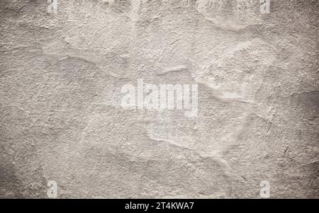 A bright wall with beautiful divots in Tallinn. Texture. Background. For text. Stock Photo