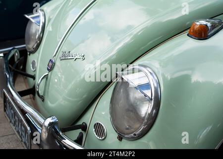 Salvador, Bahia, Brazil - November 1, 2014: Front view of a green Volkswagen Beetle model on display in the city of Salvador, Bahia. Stock Photo
