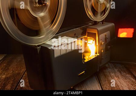 Incandescent lamp of an 8mm film projector in operation Stock Photo
