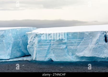 close-up of split in large tabular iceberg in waters of antarctic peninsula. antarctica Stock Photo