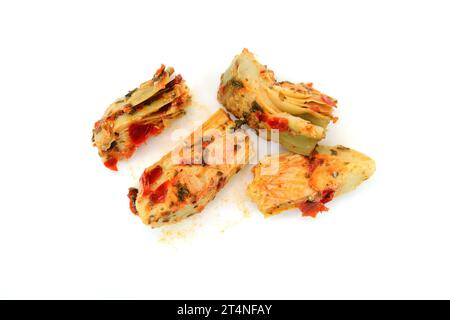 artichokes salad with vegetable mix sauce dressing isolated on white background. Stock Photo