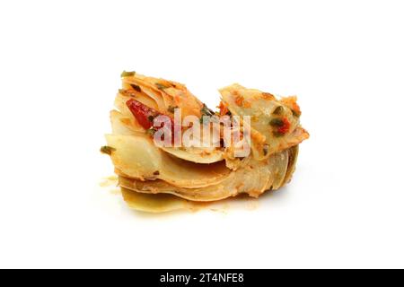 artichokes salad with vegetable mix sauce dressing isolated on white background. Stock Photo