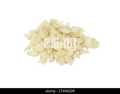 Pile of peeled flaked almonds isolated on white. Blanched almonds flakes on white. Stock Photo