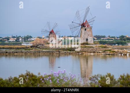 Salt flats with the old windmill, saline dello Stagnone. Marsala, Trapani, Sicily, Italy, Europe. Stock Photo