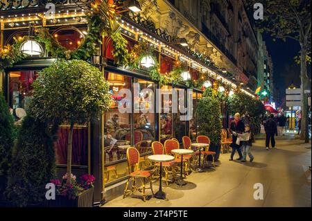 Le Dome Café during late November in Paris. It is a legendary brasserie and restaurant in Montparnasse established 1898 Stock Photo