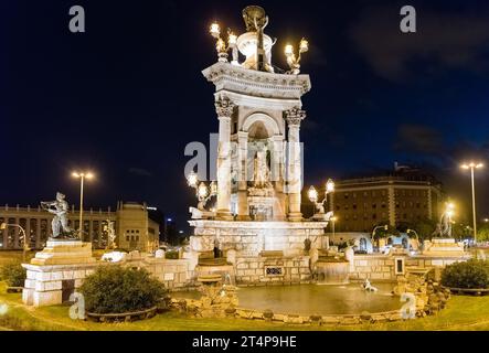 Scenic fountain as seen at night in Placa d'Espanya, one of the major intersections in Barcelona, Catalonia, Spain Stock Photo