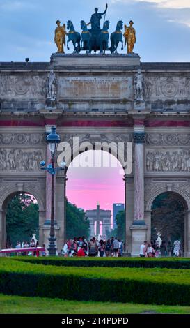 Early evening dusk over the Arc de Triomphe du Carrousel in Paris Stock Photo