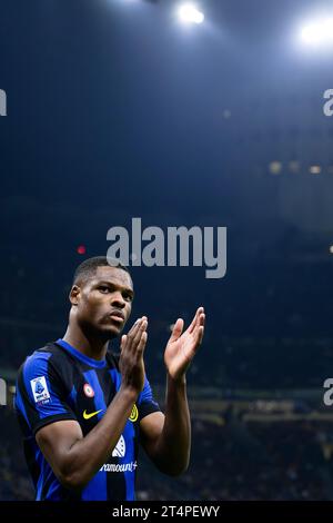 Denzel Dumfries of FC Internazionale gestures during the Serie A football match between FC Internazionale and AS Roma. Stock Photo