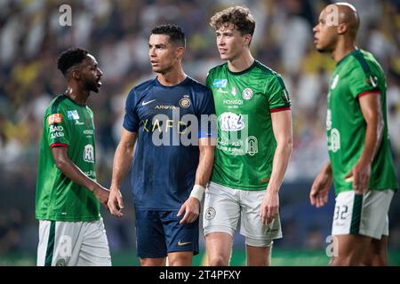 Cristiano Ronaldo of Al Nassr FC and #4 Jack Hendry of Al Ettifaq FC during their Round 16 of the SAFF Saudi Arabia KingÕs Cup 2023-24 match between Al Nassr FC and Al Ettifaq FC at Al Awwal Park Stadium on October 31, 2023 in Riyadh, Saudi Arabia. Photo by Victor Fraile / Power Sport Images Stock Photo
