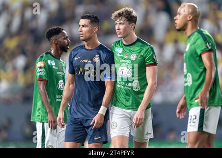 Cristiano Ronaldo of Al Nassr FC and #4 Jack Hendry of Al Ettifaq FC during their Round 16 of the SAFF Saudi Arabia KingÕs Cup 2023-24 match between Al Nassr FC and Al Ettifaq FC at Al Awwal Park Stadium on October 31, 2023 in Riyadh, Saudi Arabia. Photo by Victor Fraile / Power Sport Images Stock Photo