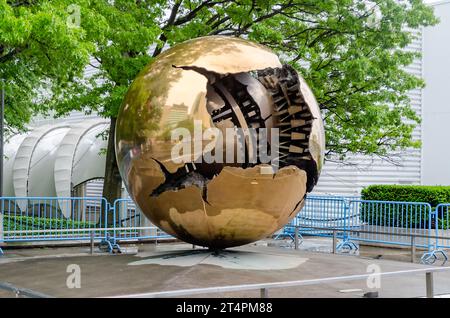 NEW YORK CITY - MAY 28: One of the famous Sphere within Sphere bronze sculptures by A. Pomodoro outside Headquarters of United Nations in New York Cit Stock Photo