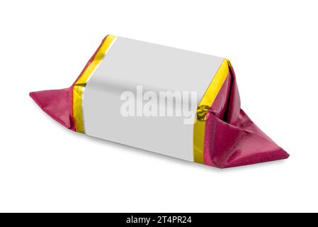 Fold-wrapped candy with gold and white purple paper, isolated on white with clipping path included. Copy space Stock Photo