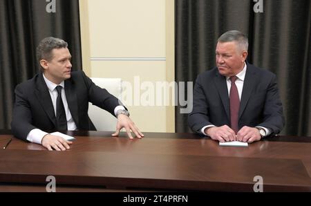 Novo-Ogaryovo, Russia. 31st Oct, 2023. Newly appointed Acting Governor of Vologda Region Geogry Filimonov, left, remarks as former Governor Oleg Kuvshinnikov, right, looks on during a meeting with Russian President Vladimir Putin at the Novo-Ogaryovo presidential state residence, October 31, 2023 outside Moscow, Russia. Credit: Gavriil Grigorov/Kremlin Pool/Alamy Live News Stock Photo