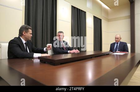 Novo-Ogaryovo, Russia. 31st Oct, 2023. Russian President Vladimir Putin, right, meets with the former Governor of Vologda Region Oleg Kuvshinnikov, center, and newly appointed Acting Governor of Vologda Region Georgy Filimonov, left, at the Novo-Ogaryovo presidential state residence, October 31, 2023 outside Moscow, Russia. Credit: Gavriil Grigorov/Kremlin Pool/Alamy Live News Stock Photo