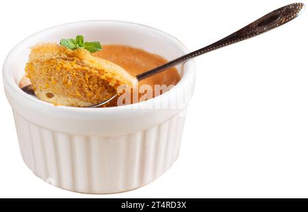 Butternut squash souffle in two white ramekins, isolated on white background. Stock Photo