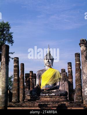Thailand. Sukhothai. Wat Mahathat Temple. Buddha statue. Stock Photo