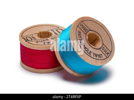 Two Thread Bobbins Cut Out on White. Stock Photo
