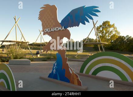 Display features an American Bald Eagle with wings spread at the Oklahoma Welcome Center. The center is located off I-40 west coming into OK from Ark. Stock Photo