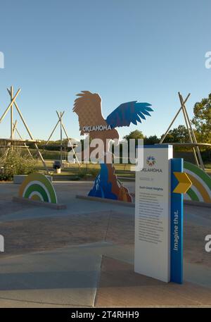 Display features an American Bald Eagle with wings spread at the Oklahoma Welcome Center. The center is located off I-40 west coming into OK from Arka Stock Photo