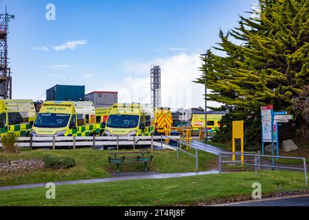 Truro, UK. 1st Nov, 2023. Ambulances wait outside A & E at The Royal Cornwall Hospital in Treliske, Truro on a sunny Day. Patients are having to wait their turn which can be many hours to be taken in to A&E to be seen. Credit: Keith Larby/Alamy Live News Stock Photo