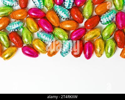 This is what dreams are made of. Studio shot of a dazzling array of multicolored easter eggs wrapped in foil. Stock Photo