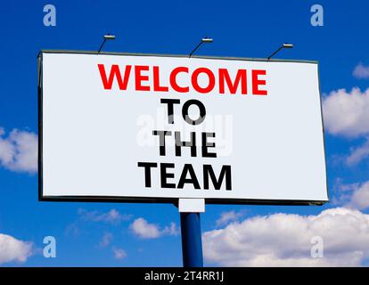 Welcome to the team symbol. Concept words Welcome to the team on beautiful big white billboard. Beautiful blue sky cloud background. Business, motivat Stock Photo