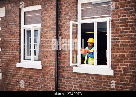 I have so many ideas for this building. a engineer making notes while on a construction site. Stock Photo