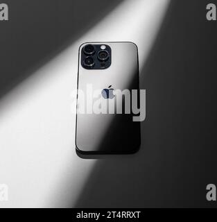 Berlin, Germany October 30 2023 Iphone back view with camera and apple logo Stock Photo