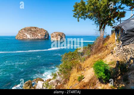 View from the coastline of the large boulder islands offshore near Banderas Bay at Los Arcos National Park along the Mexican Riviera, Puerto Vallarta Stock Photo