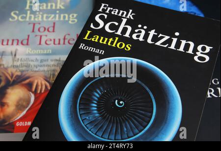 Viersen, Germany - October 9. 2023: Closeup of german author Frank Schätzing book covers Stock Photo